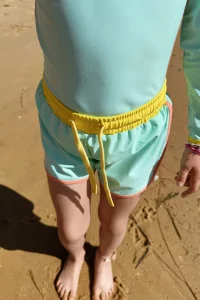 Kids Anti-UV Swim Shorts Baïnes Kiwi Retro – Turquoise | Centre Commercial